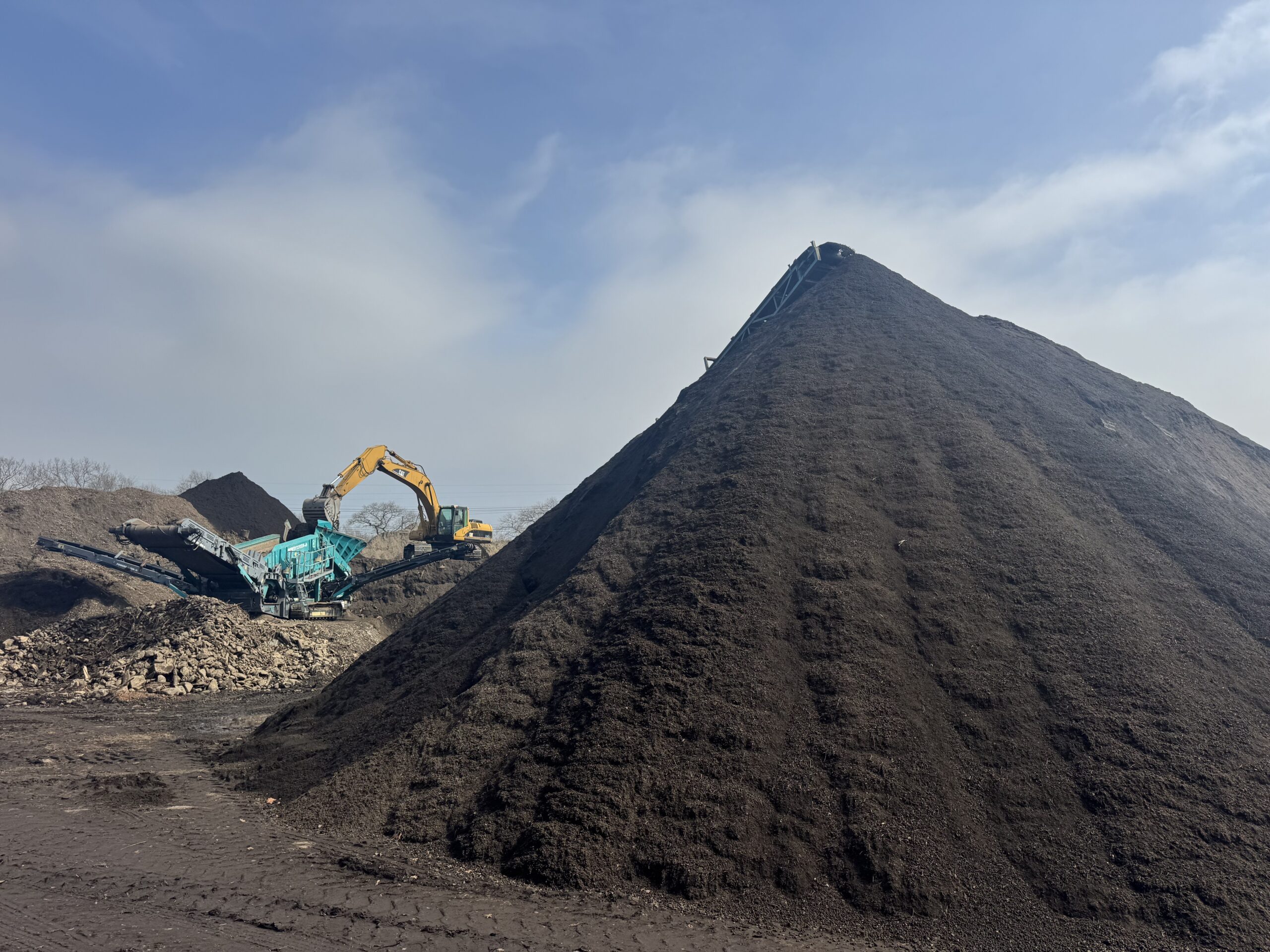 Bulk screened topsoil stockpile at Grillo Services 20-acre facility in Milford CT